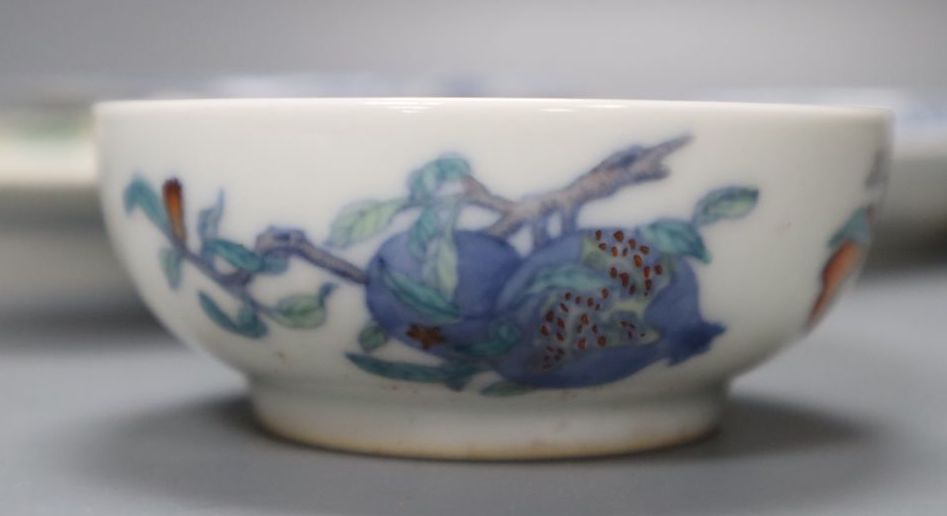 Three Chinese saucers, Chinese tea bowl, 18th century English tea bowl, largest 14cm